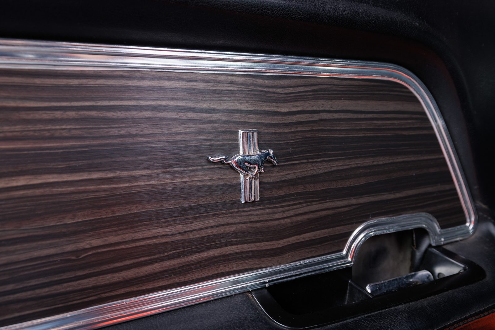 1970 Mach 1 door panel with woodgrain and Mustang emblem