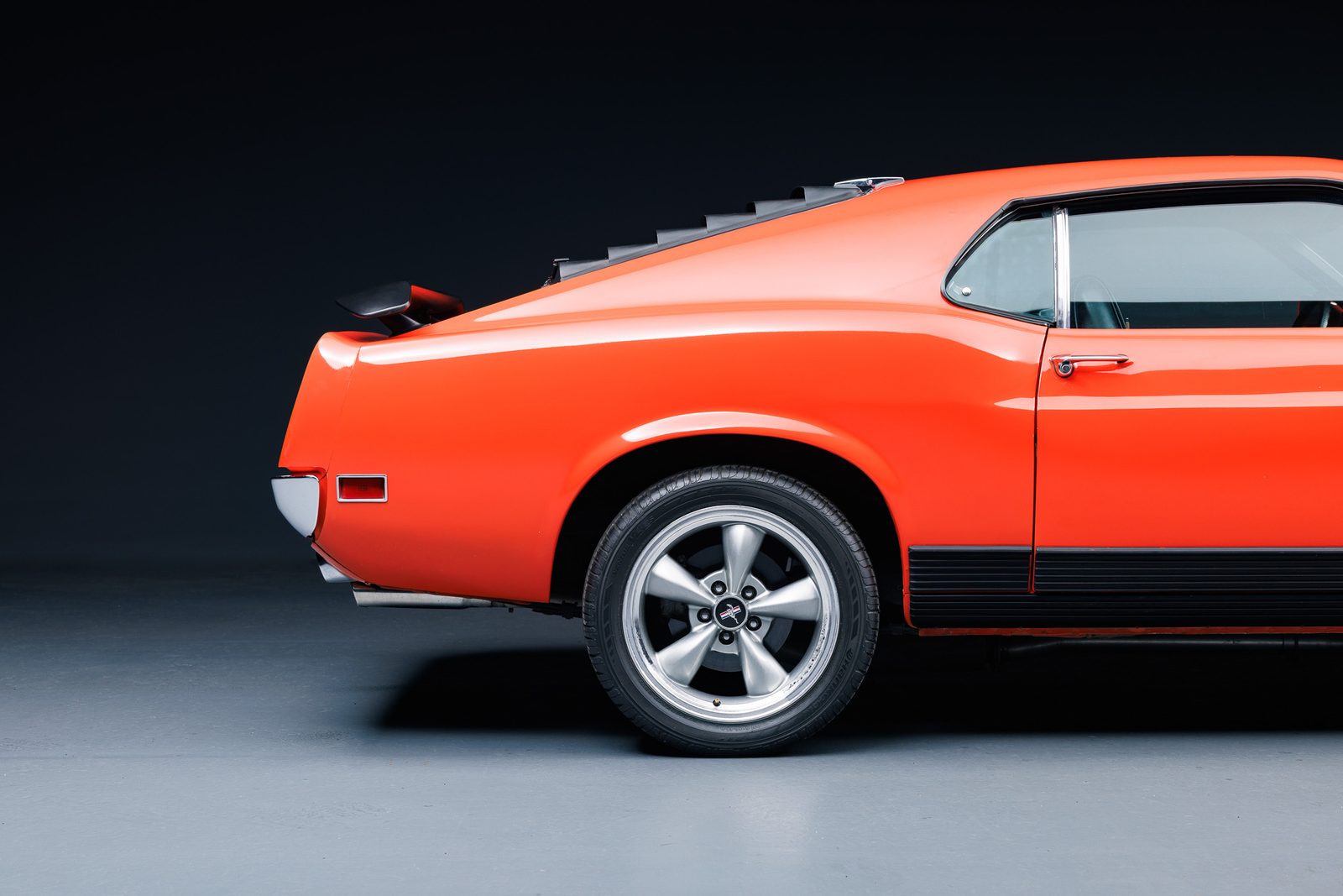 Calypso Coral Mach 1 rear three-quarter with spoiler and slats